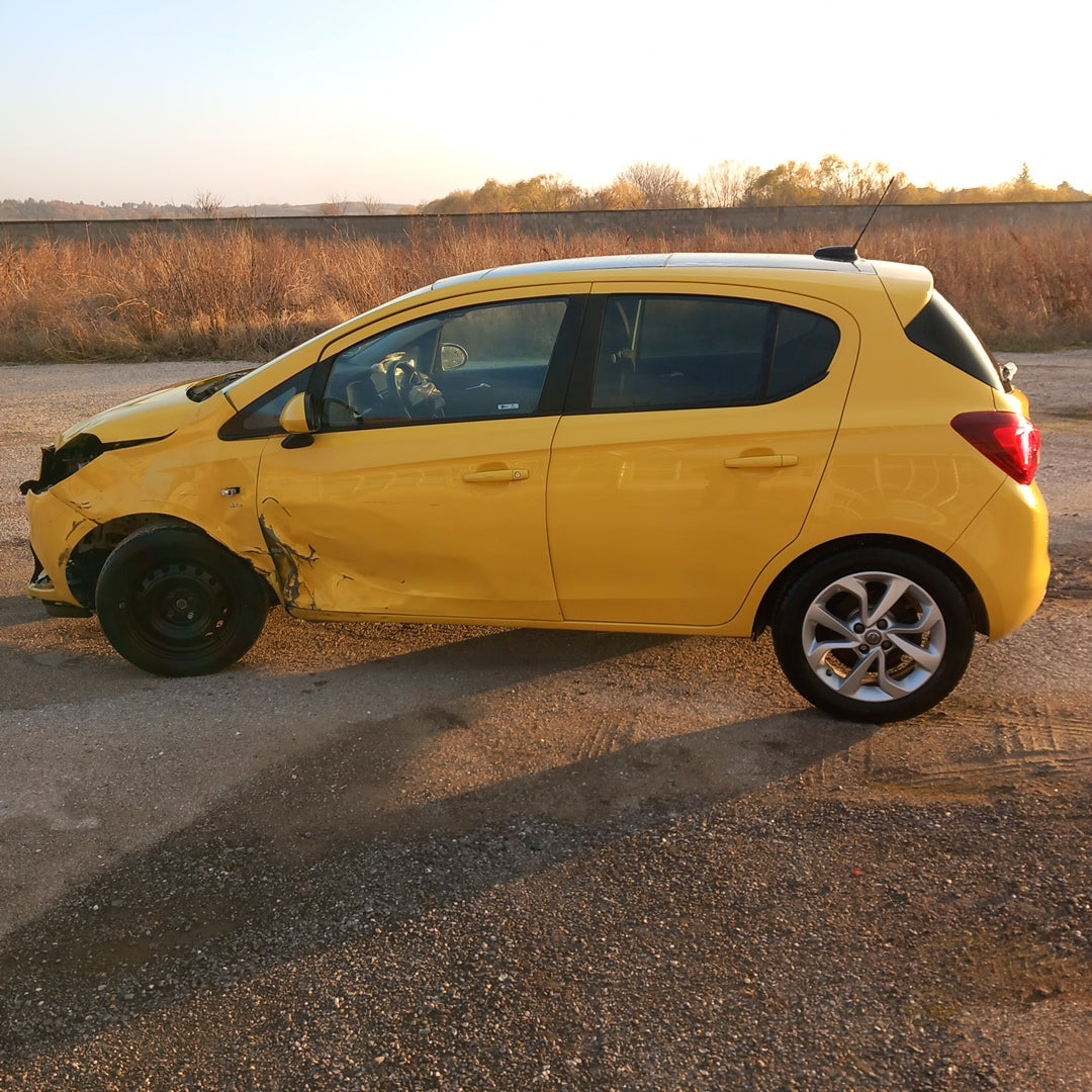 Opel Corsa E yellow 1,4 turbo 101 кс B14NEJ 2015 г./ X1501 снимки