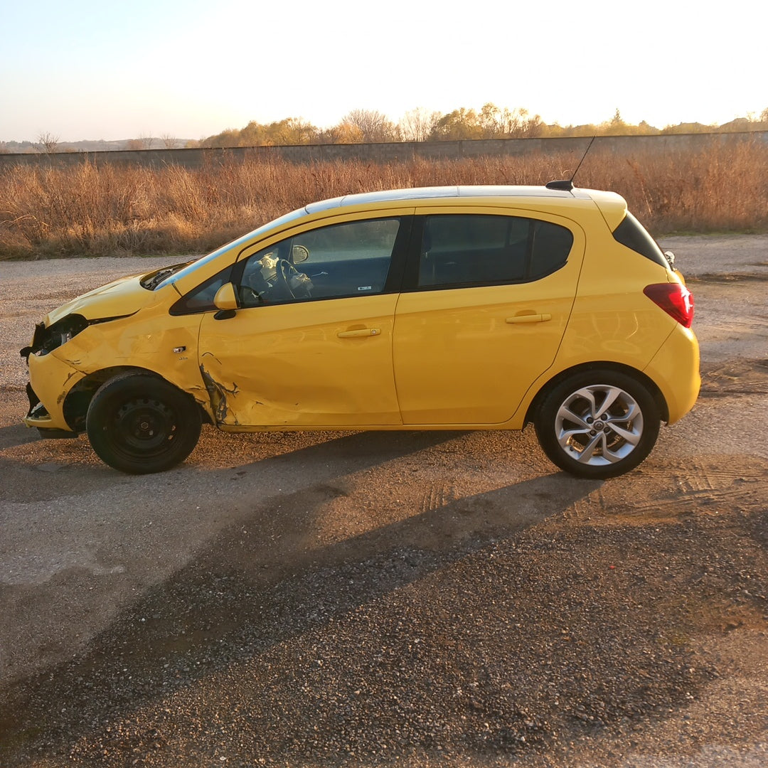 Opel Corsa E yellow 1,4 turbo 101 кс B14NEJ 2015 г./ X1501 снимки