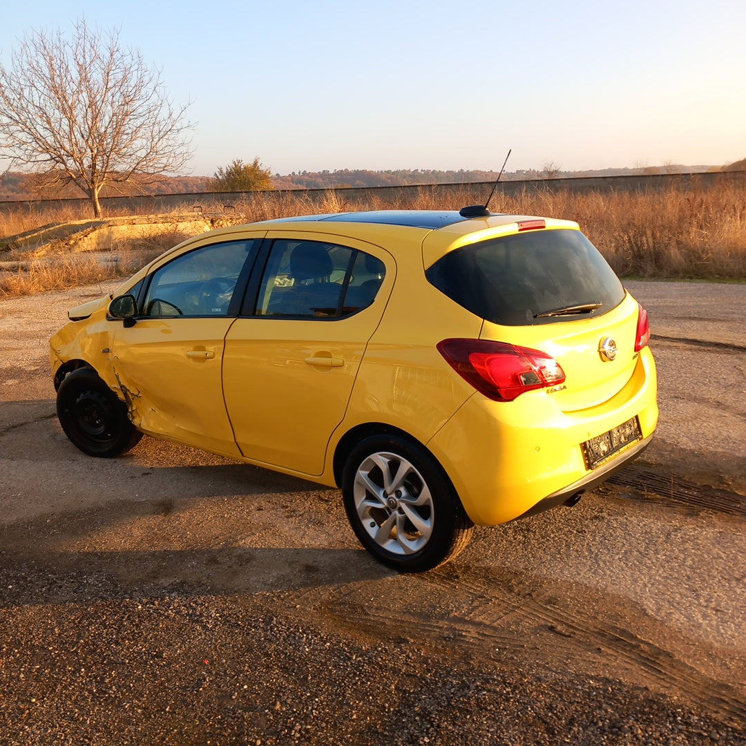 Opel Corsa E yellow 1,4 turbo 101 кс B14NEJ 2015 г./ X1501 снимки