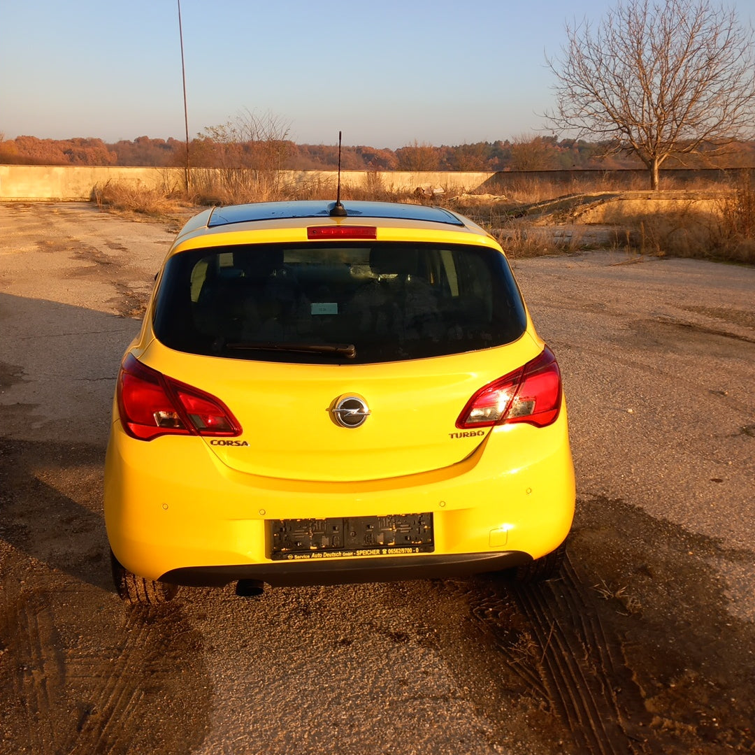 Opel Corsa E yellow 1,4 turbo 101 кс B14NEJ 2015 г./ X1501 снимки