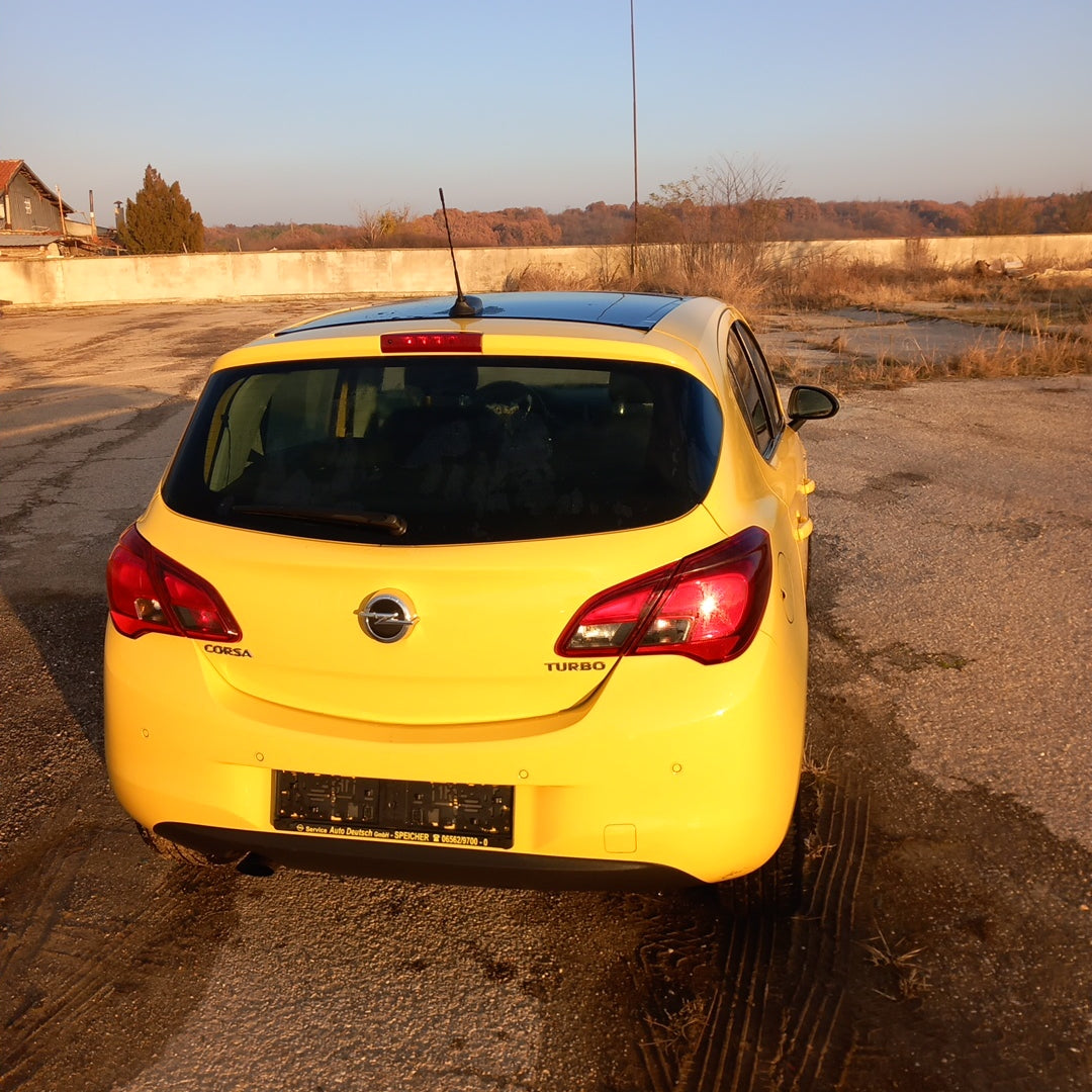Opel Corsa E yellow 1,4 turbo 101 кс B14NEJ 2015 г./ X1501 снимки