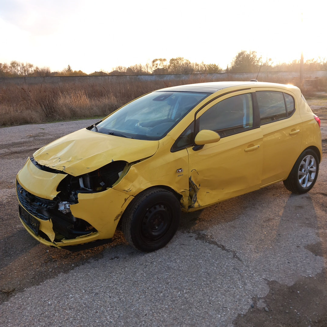 Opel Corsa E yellow 1,4 turbo 101 кс B14NEJ 2015 г./ X1501 снимки