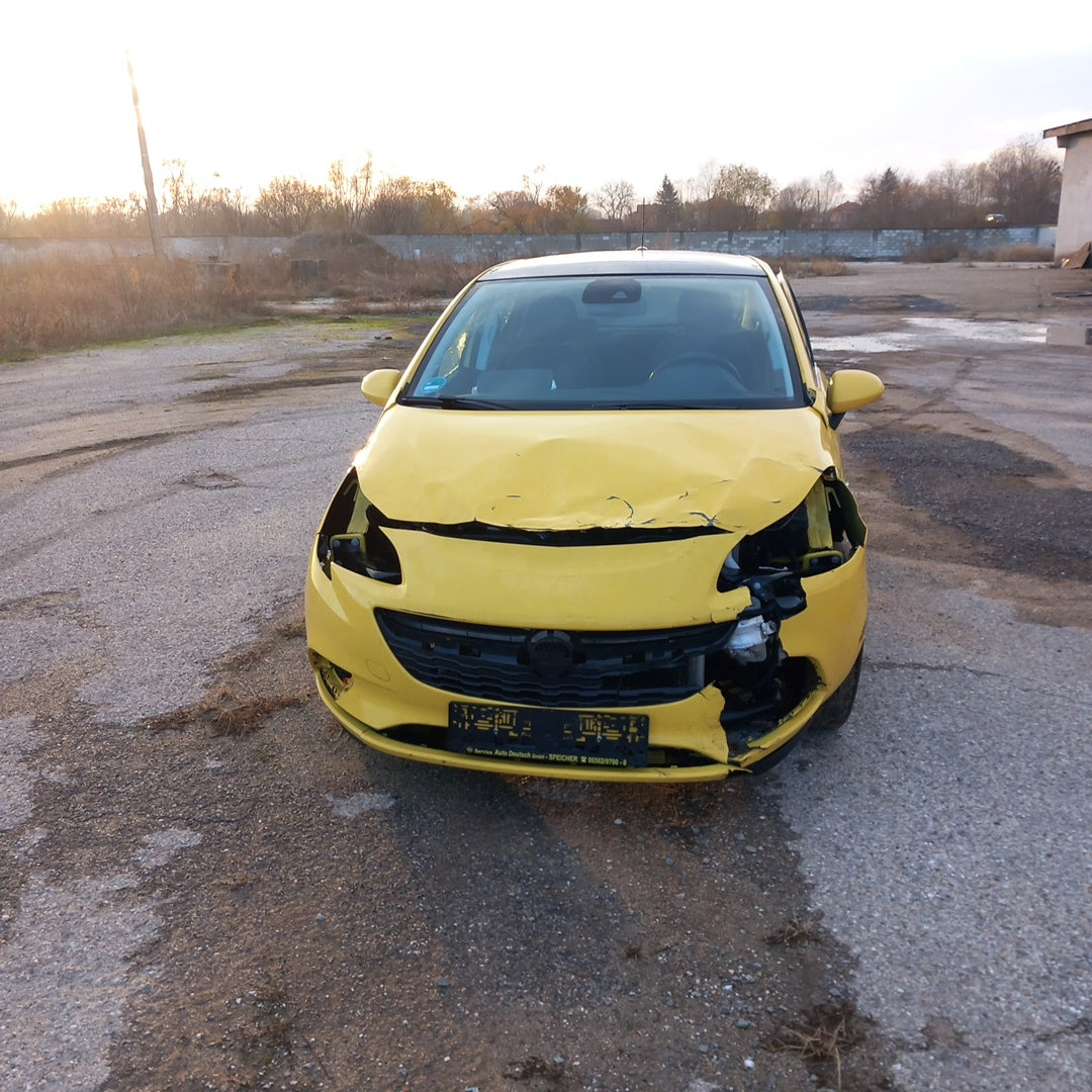 Opel Corsa E yellow 1,4 turbo 101 кс B14NEJ 2015 г./ X1501 снимки