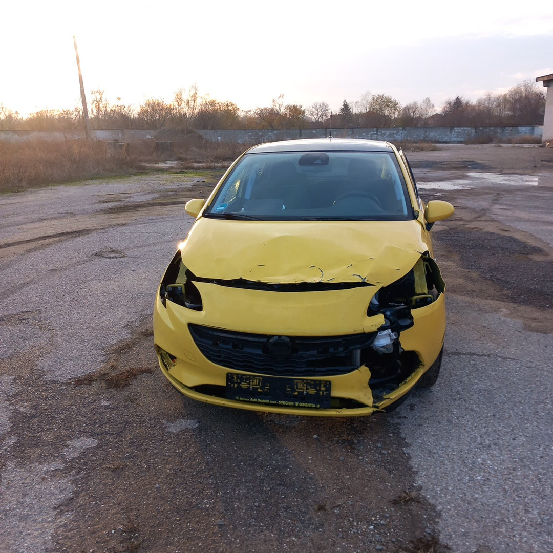 Opel Corsa E yellow 1,4 turbo 101 кс B14NEJ 2015 г./ X1501 снимки
