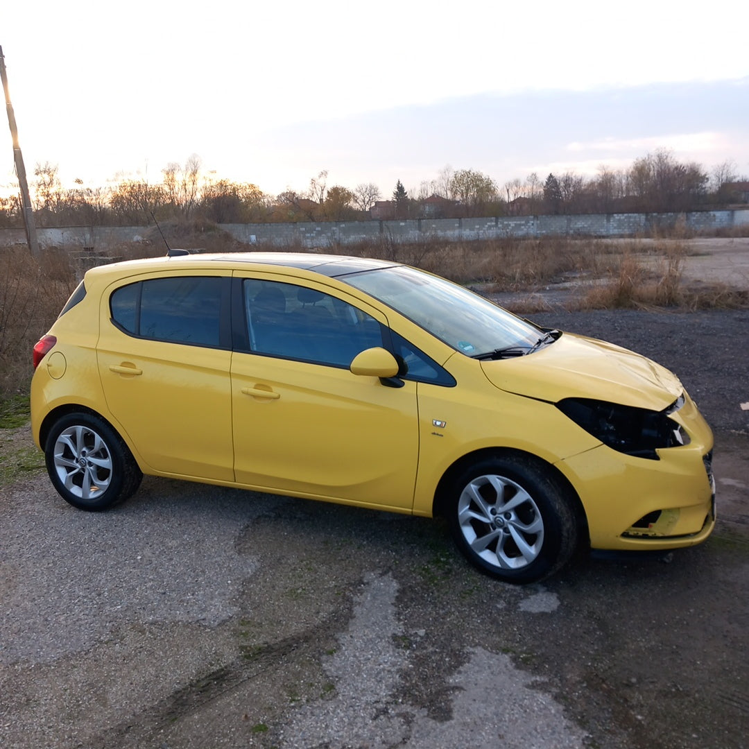 Opel Corsa E yellow 1,4 turbo 101 кс B14NEJ 2015 г./ X1501 снимки