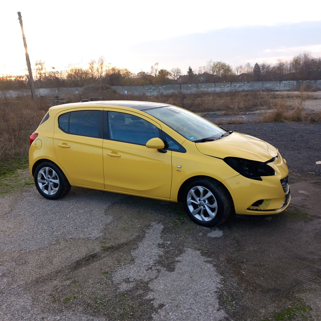 Opel Corsa E yellow 1,4 turbo 101 кс B14NEJ 2015 г./ X1501 снимки