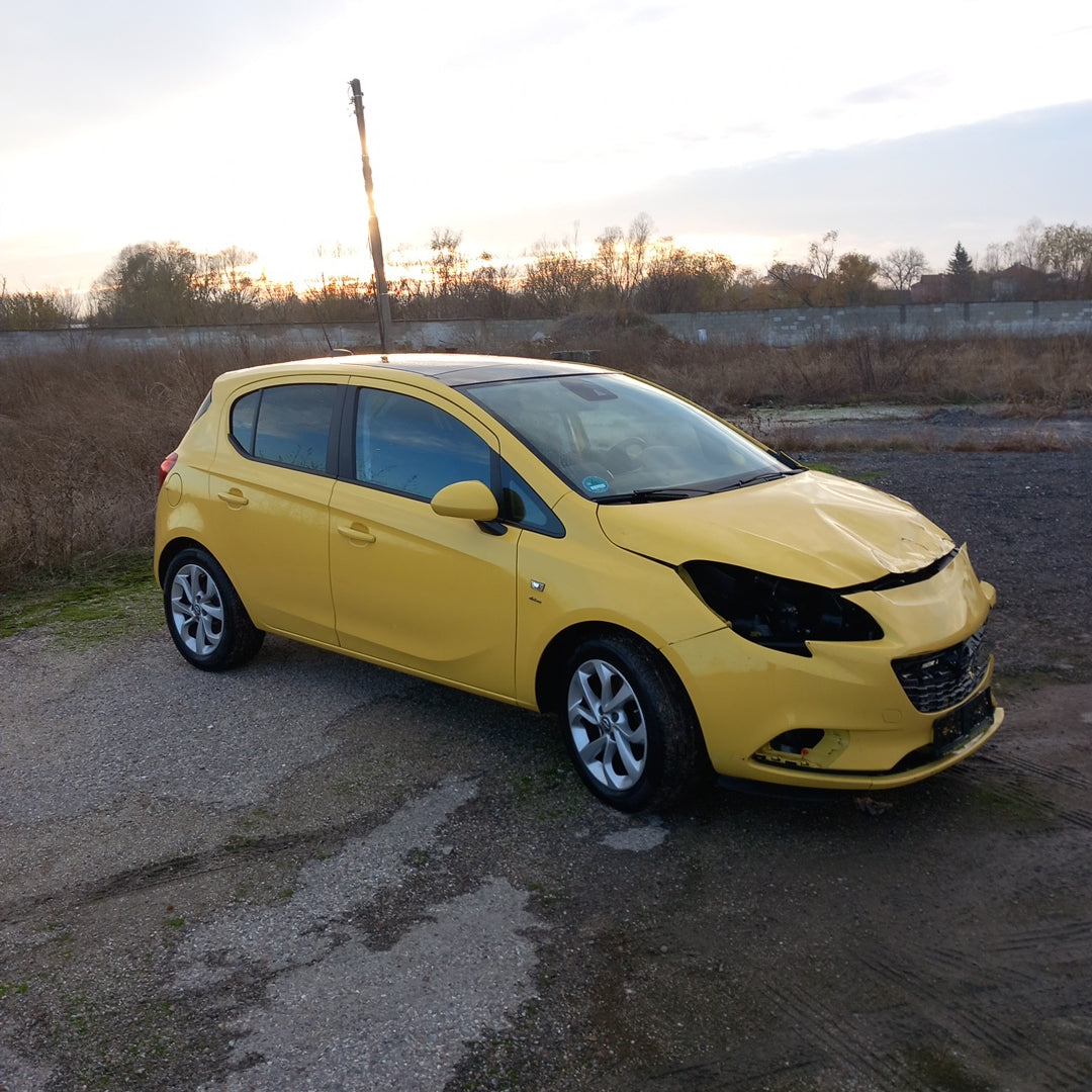 Opel Corsa E yellow 1,4 turbo 101 кс B14NEJ 2015 г./ X1501 снимки