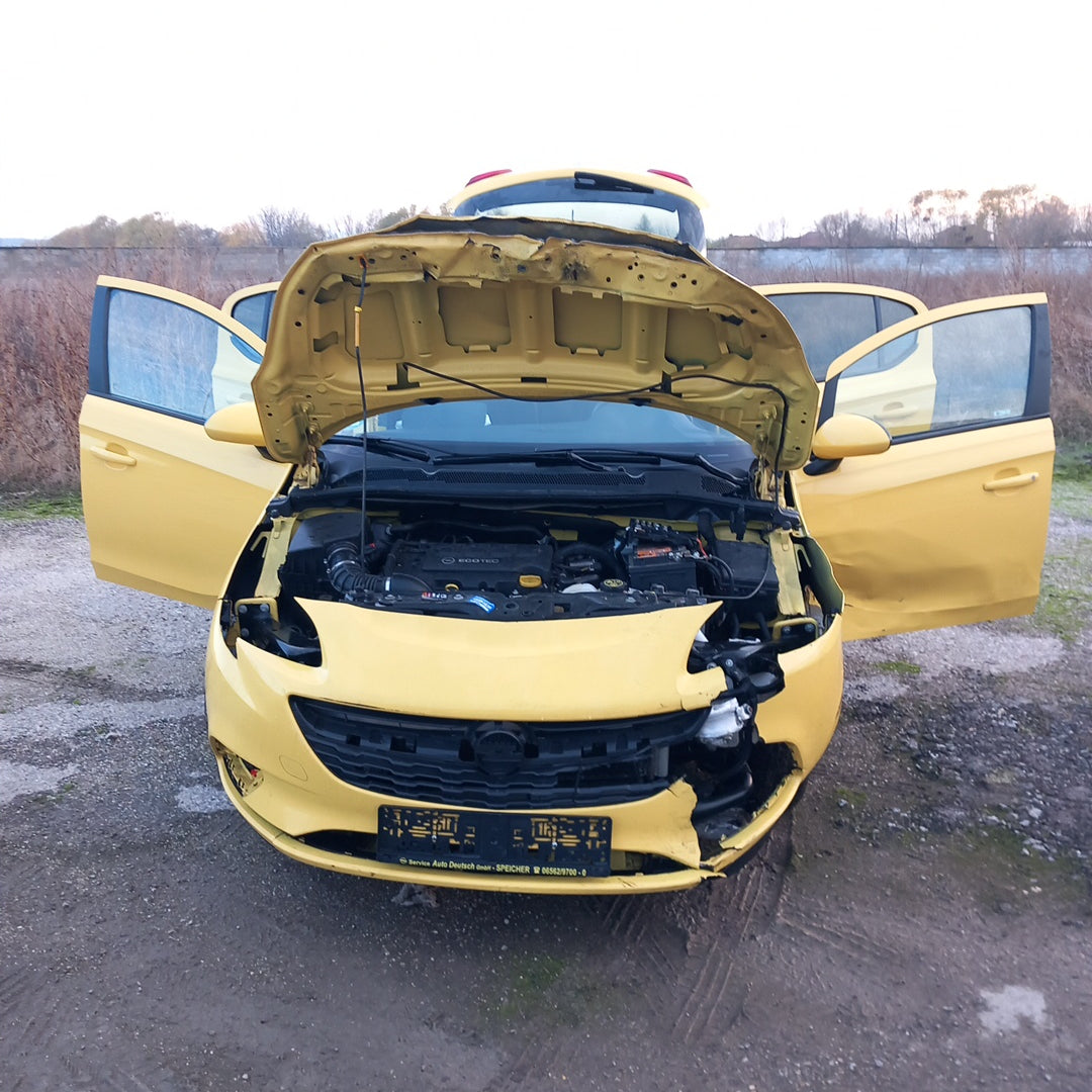 Opel Corsa E yellow 1,4 turbo 101 кс B14NEJ 2015 г./ X1501 снимки