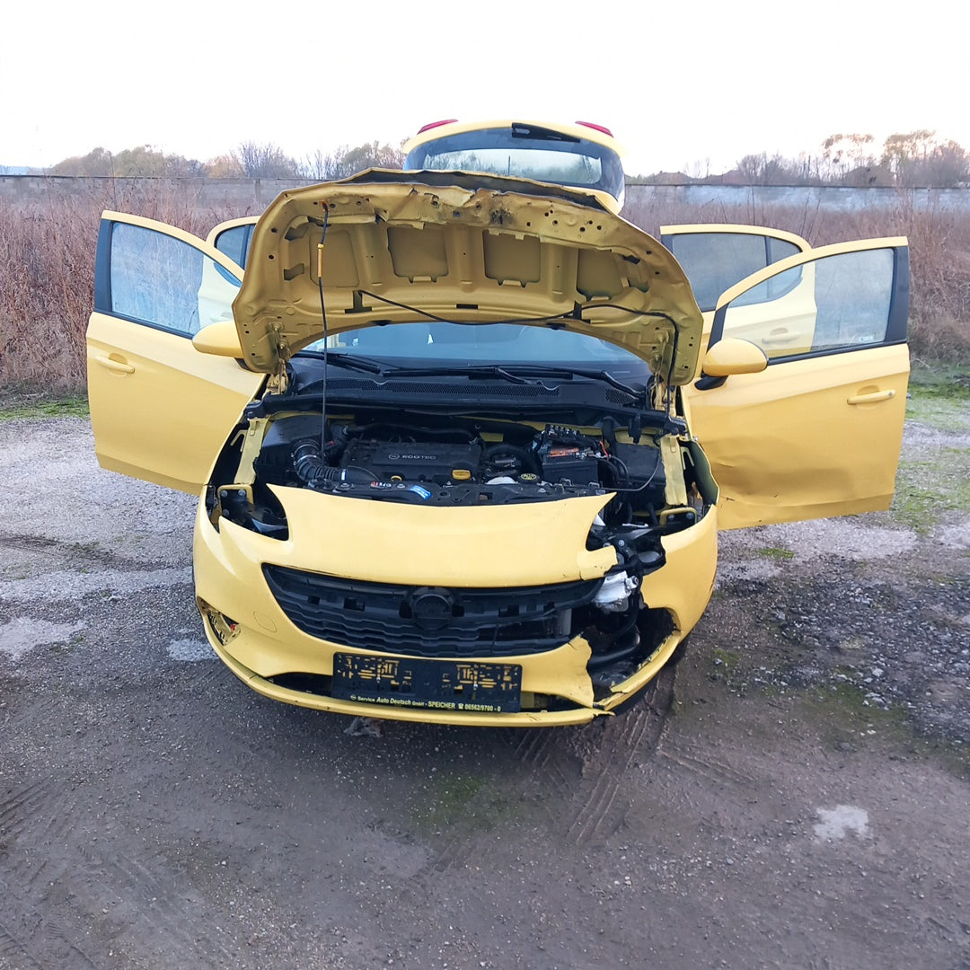 Opel Corsa E yellow 1,4 turbo 101 кс B14NEJ 2015 г./ X1501 снимки