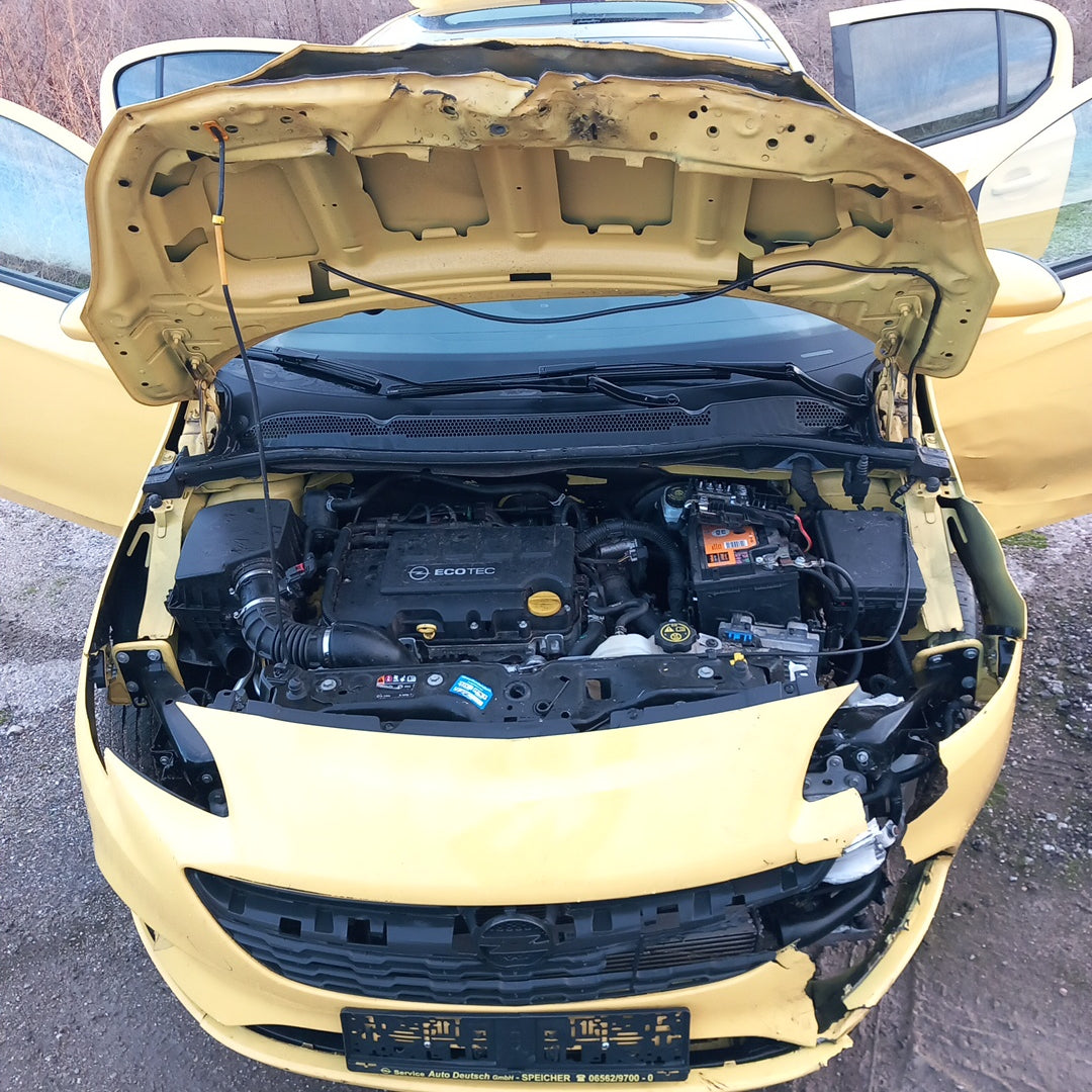 Opel Corsa E yellow 1,4 turbo 101 кс B14NEJ 2015 г./ X1501 снимки