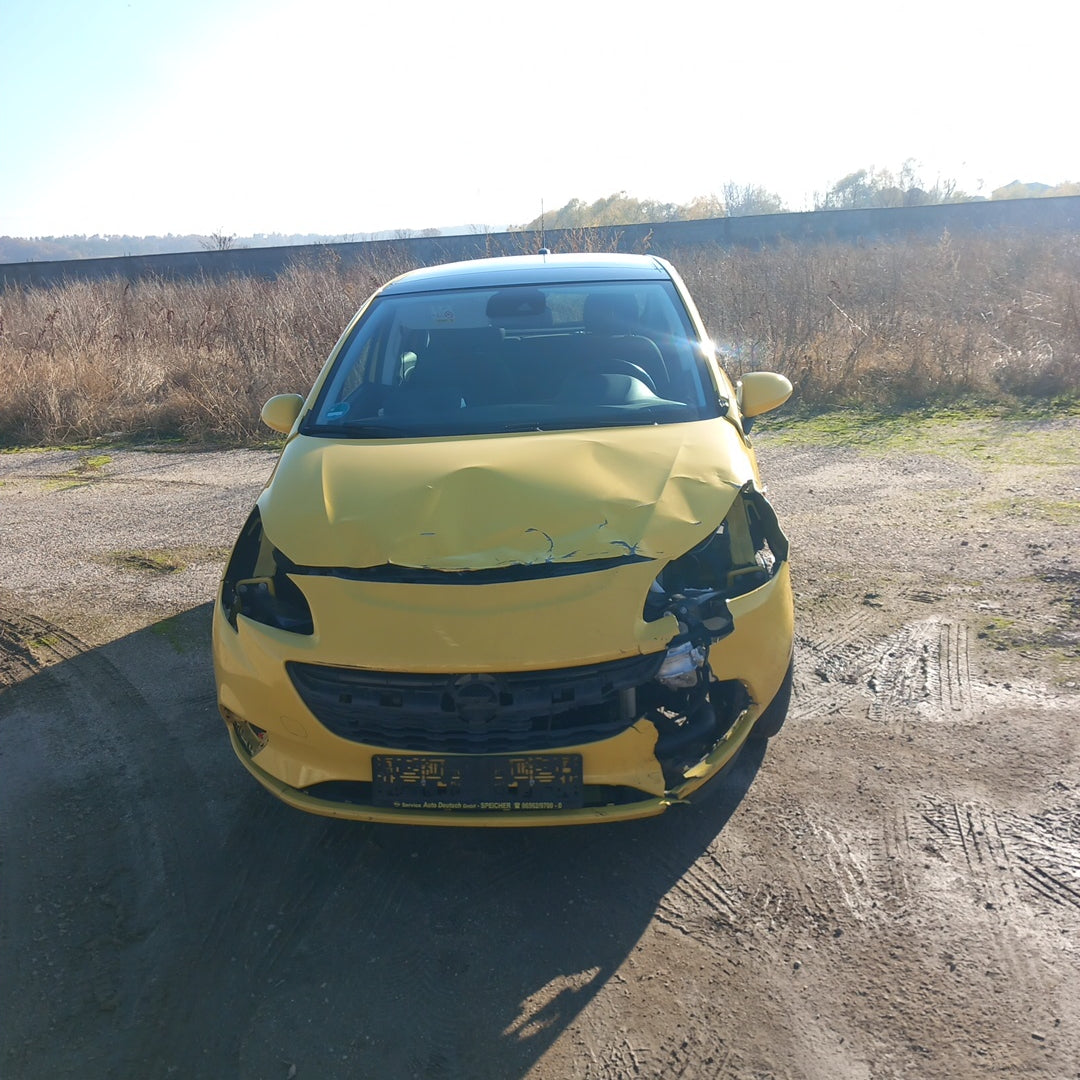 Opel Corsa E yellow 1,4 turbo 101 кс B14NEJ 2015 г./ X1501 снимки