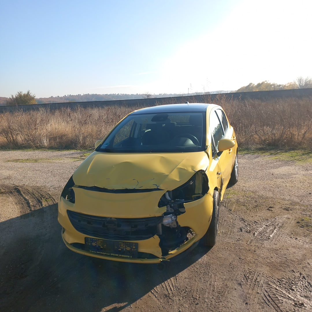 Opel Corsa E yellow 1,4 turbo 101 кс B14NEJ 2015 г./ X1501 снимки