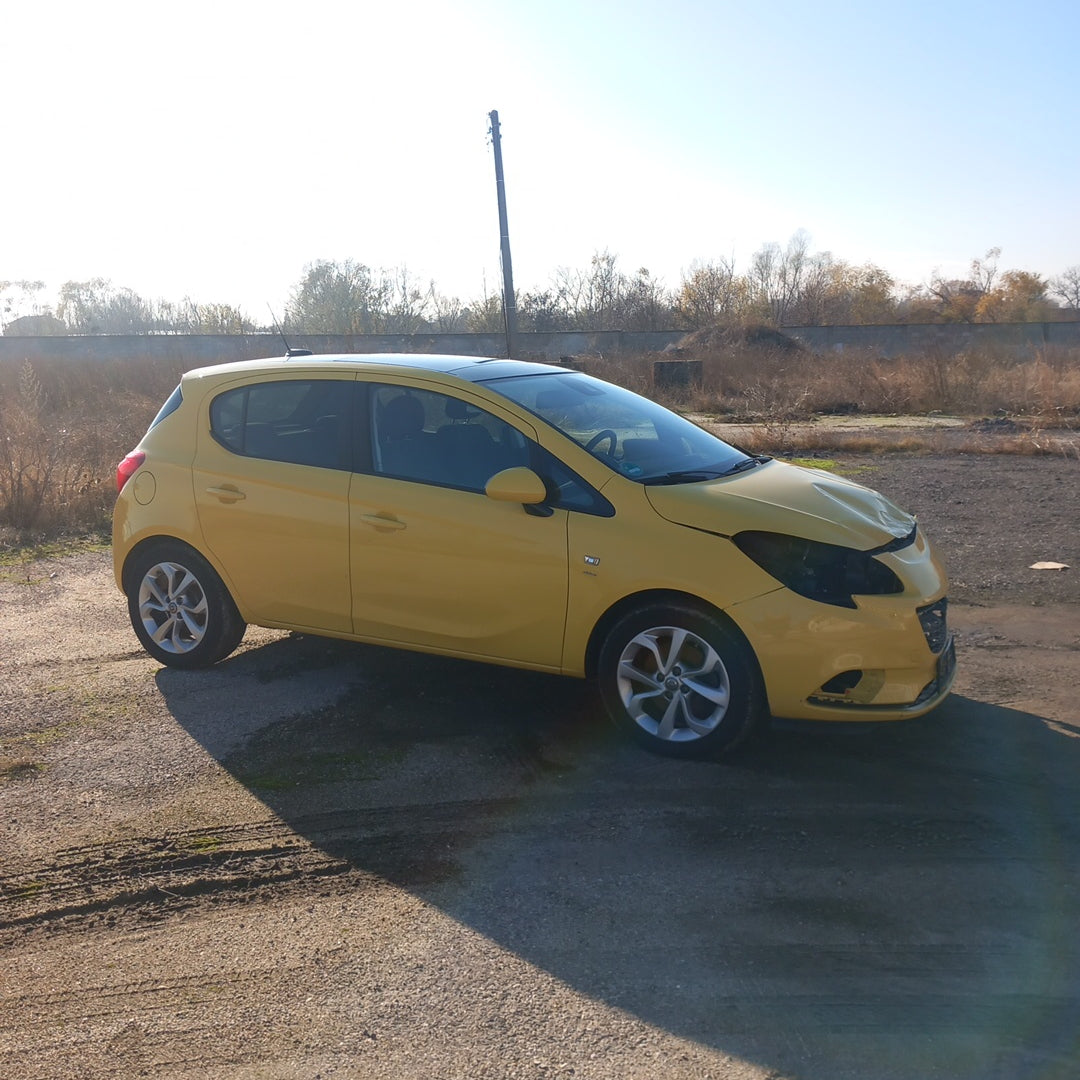 Opel Corsa E yellow 1,4 turbo 101 кс B14NEJ 2015 г./ X1501 снимки
