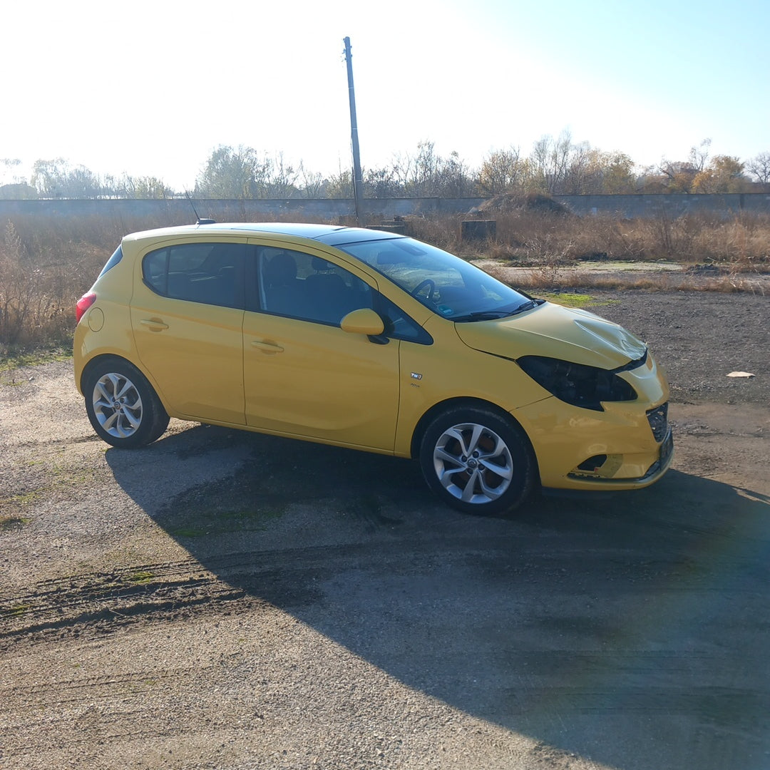 Opel Corsa E yellow 1,4 turbo 101 кс B14NEJ 2015 г./ X1501 снимки