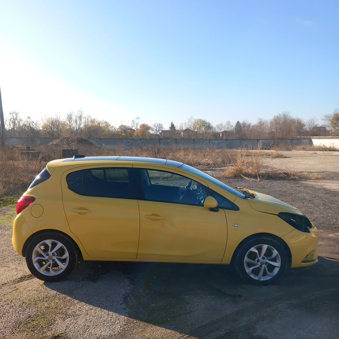 Opel Corsa E yellow 1,4 turbo 101 кс B14NEJ 2015 г./ X1501 снимки