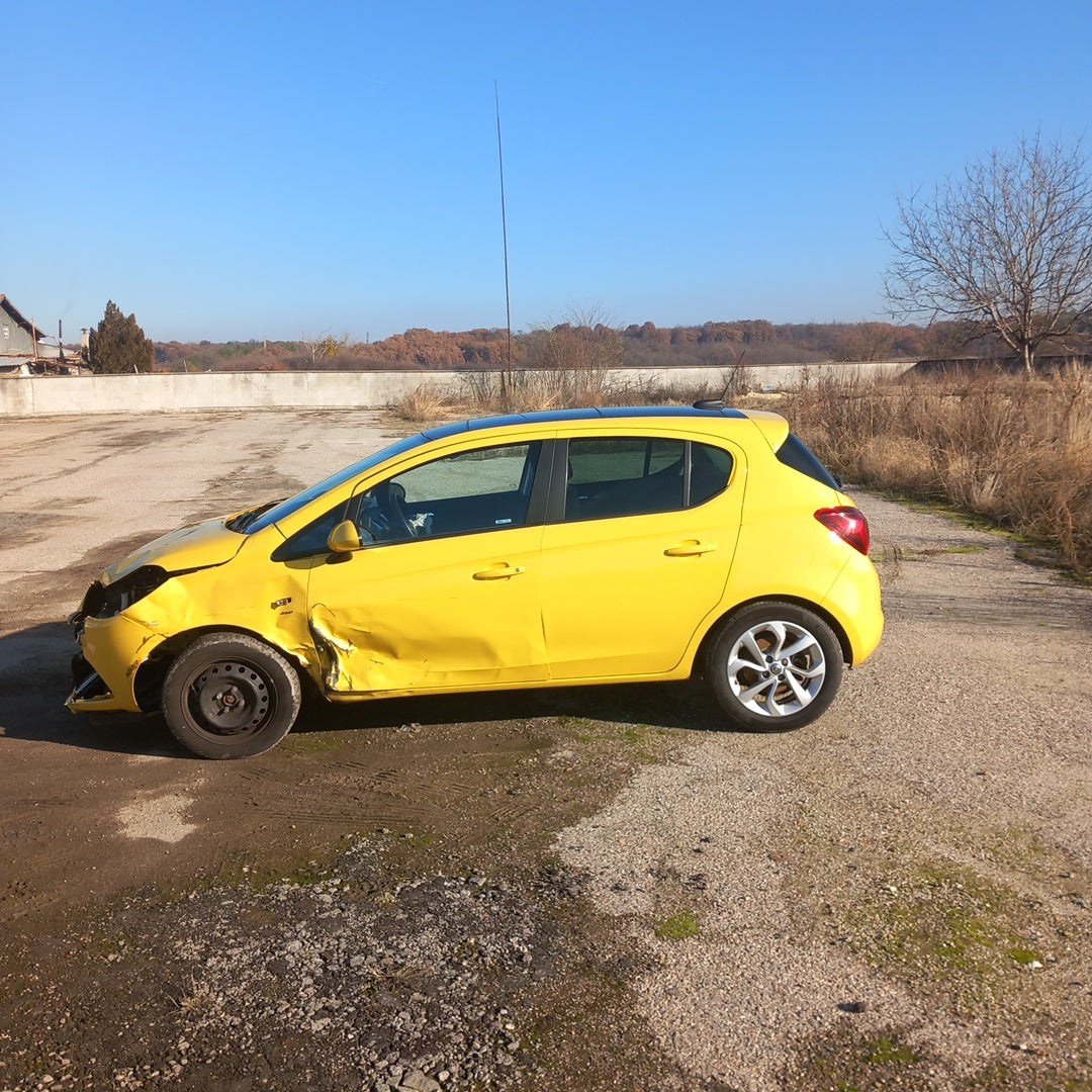 Opel Corsa E yellow 1,4 turbo 101 кс B14NEJ 2015 г./ X1501 снимки