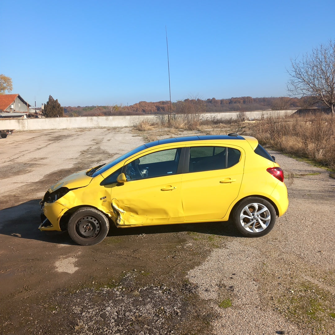 Opel Corsa E yellow 1,4 turbo 101 кс B14NEJ 2015 г./ X1501 снимки