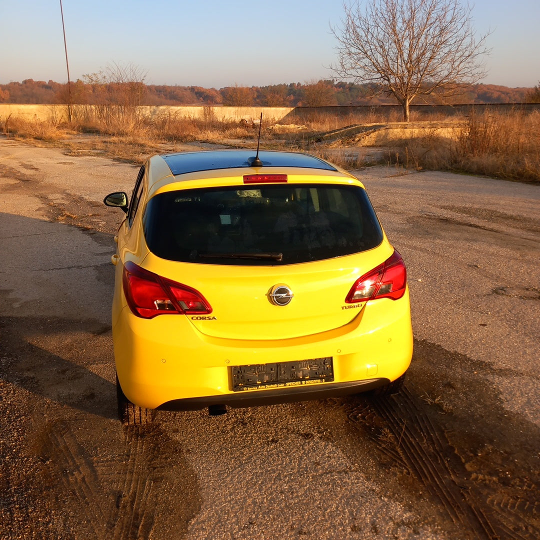 Opel Corsa E yellow 1,4 turbo 101 кс B14NEJ 2015 г./ X1501 снимки