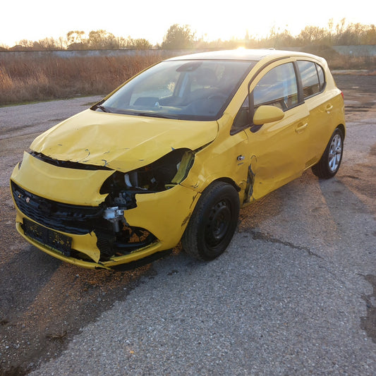 Opel Corsa E yellow 1,4 turbo 101 кс B14NEJ 2015 г./ X1501 снимки