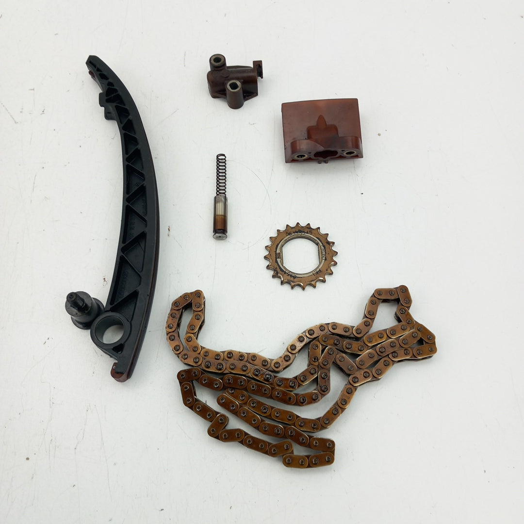 Обтегачи зъбно колело и верига непълен комплект със забележка Opel Corsa D 1,2 A12XER