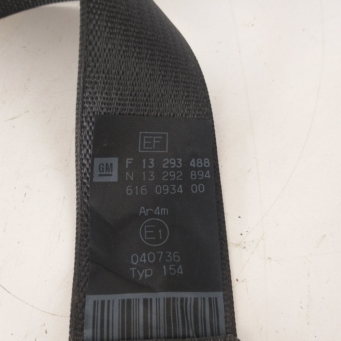 Колан предпазен централен заден черен EF задна седалка долна Opel Corsa D